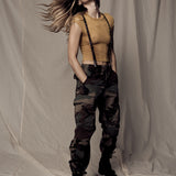 brown and silver studded skinny suspenders.