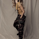 brown and silver studded skinny suspenders.