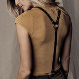 brown and silver studded skinny suspenders.