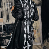 matrix leather trench coat.