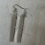 dagger earrings.